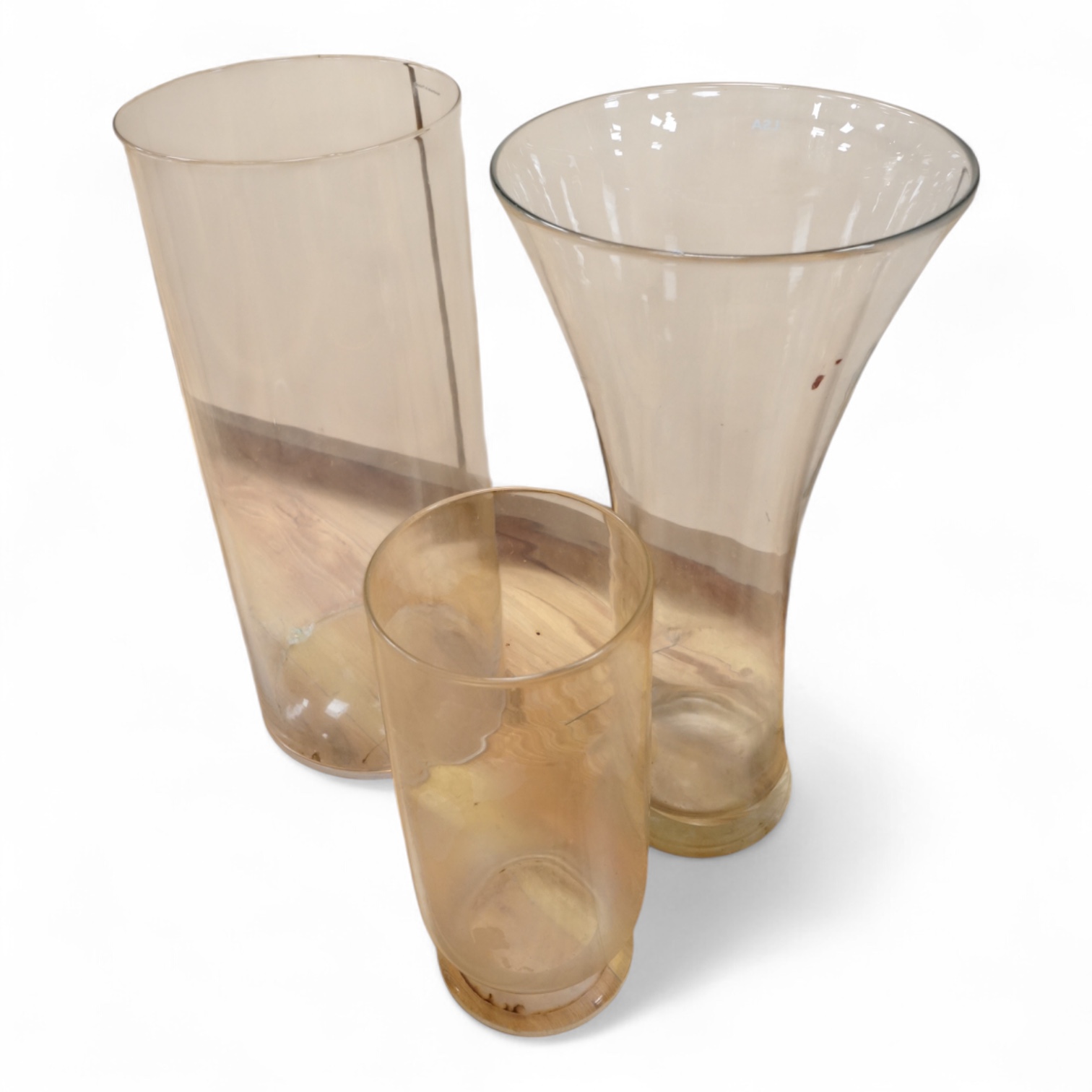 Three large glass vases, tallest 60.5cm